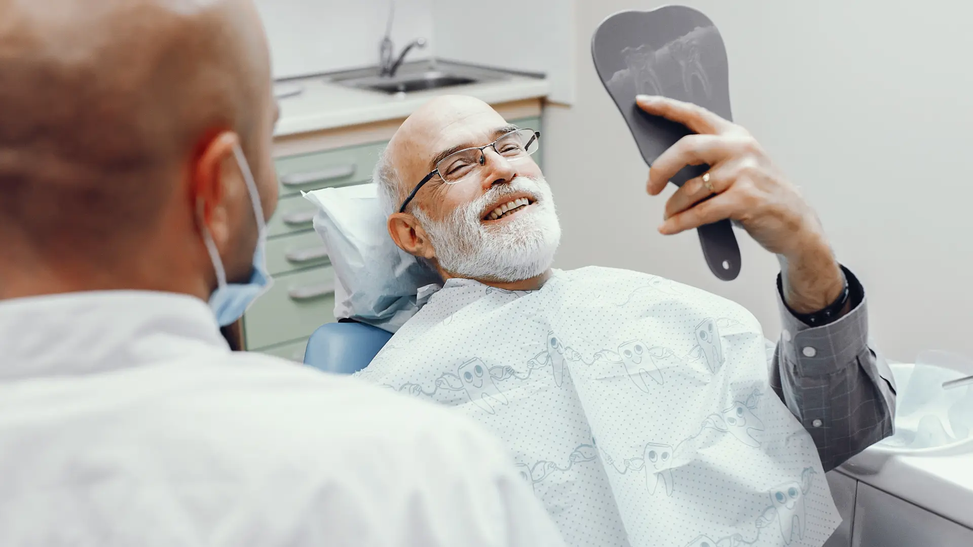 Dentist demonstrating root canal treatment