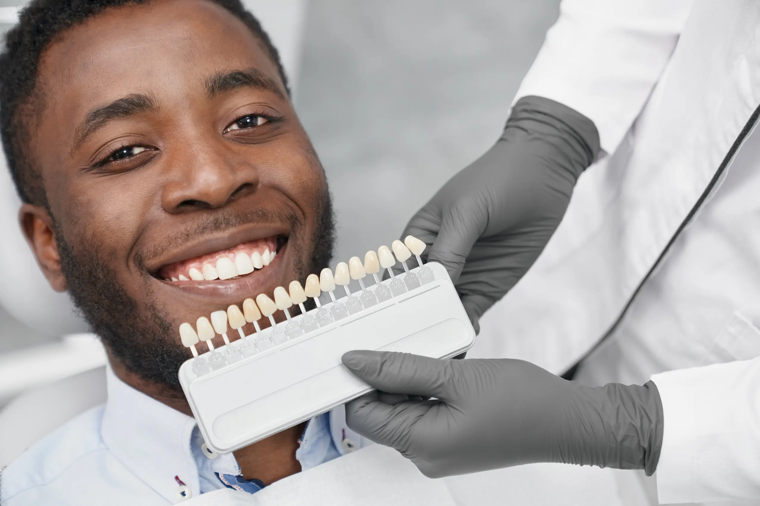 patient happy about his teeth whitening treatment at Sugar Land