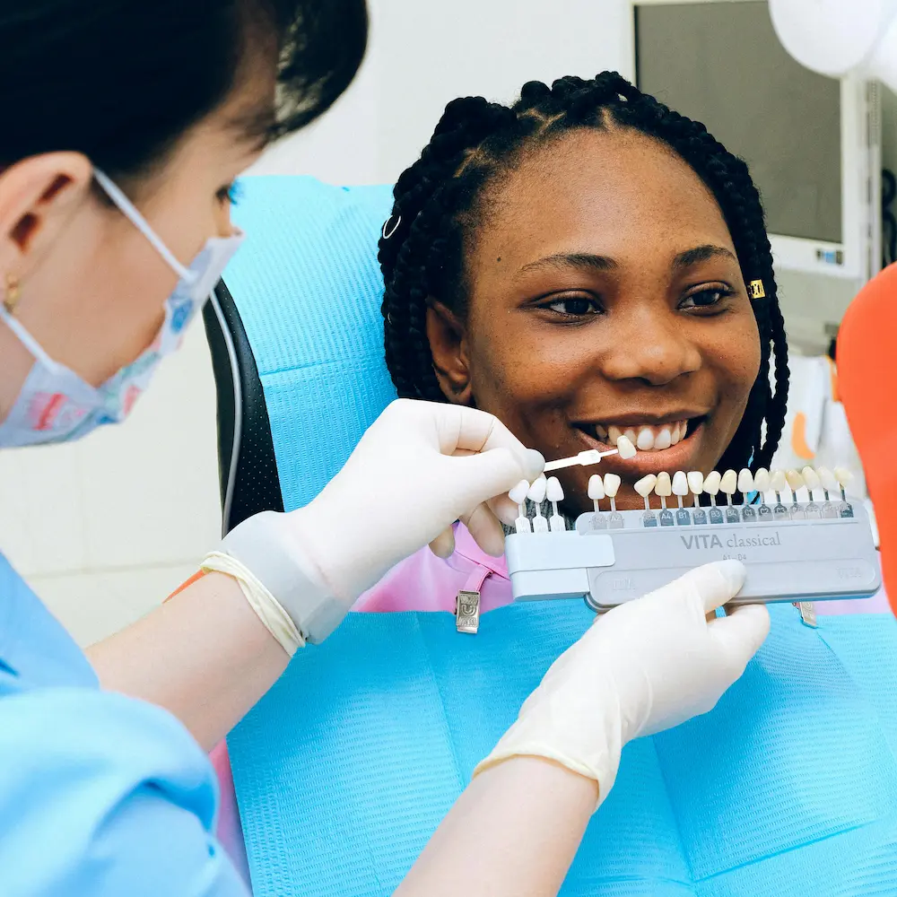 Woman smiling during cosmetic veneer treatment